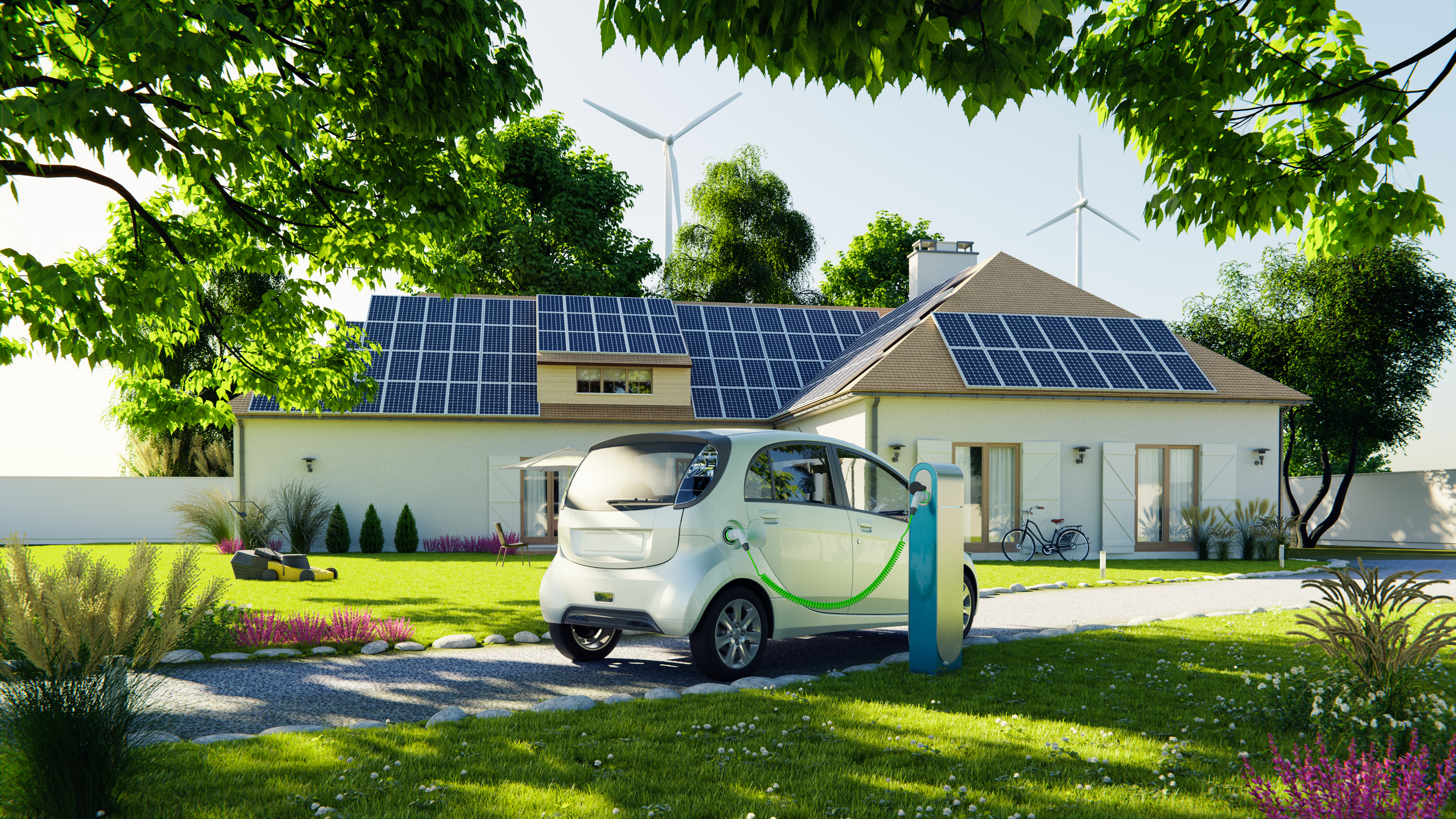 A small electric car is charging at a home with solar panels on the roof and a charging station in the driveway.