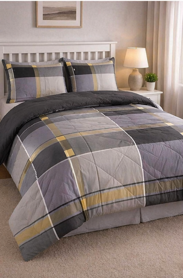 Plaid-pattern bed with a gray, purple, and yellow comforter set on a white bed frame, paired with matching pillows and a bedside lamp in a cozy bedroom. Bedding fabric lasts longest in canada